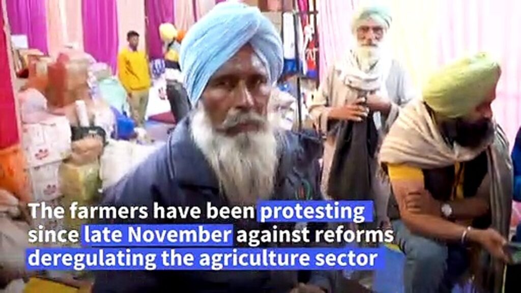 Foot massages, tattoos and dentists for defiant India farmers